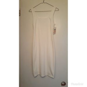 White bodycon dress with gold zipper on back